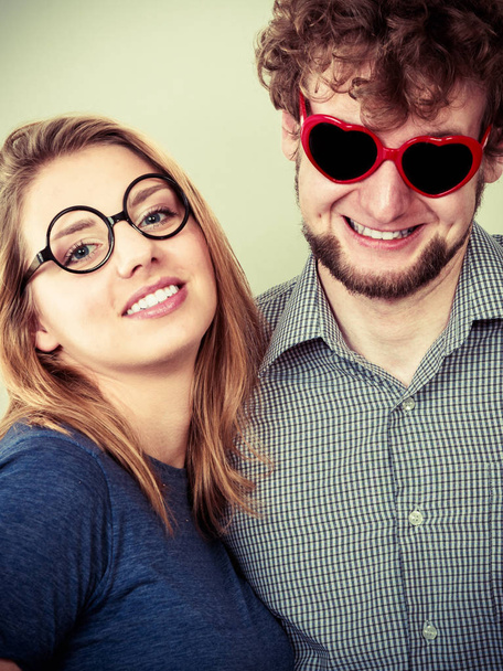 Happy couple man and woman in glasses. - Foto, Bild