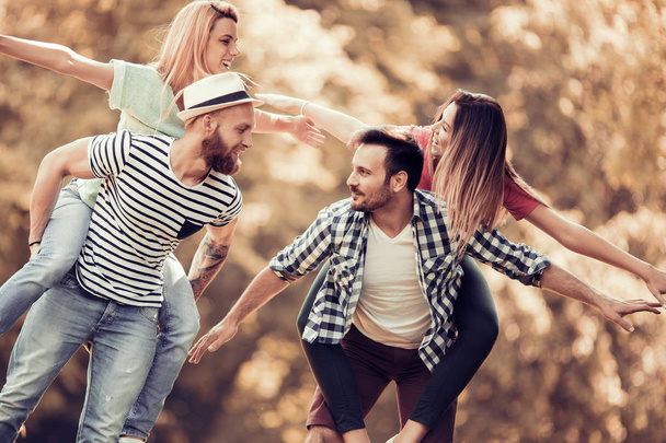 Group of friends having fun together outdoors - Φωτογραφία, εικόνα