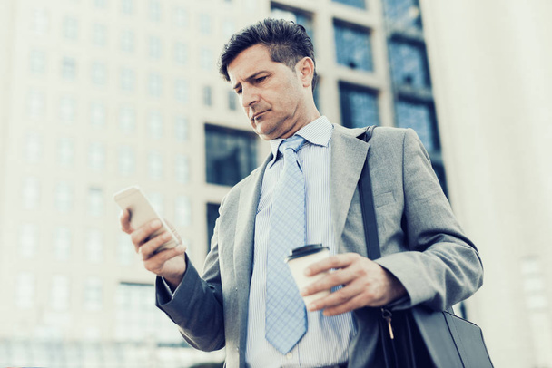 Businessman using a smart phone. - Foto, Imagen