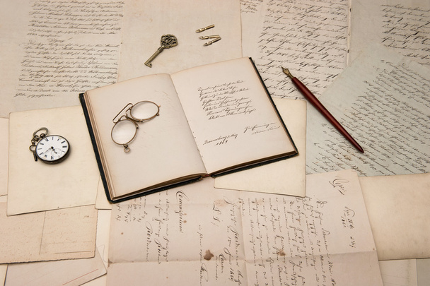 Open book over old letters and postcards - Fotó, kép