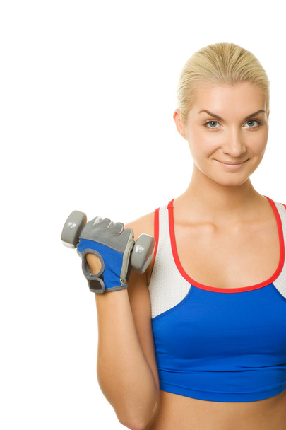 Entrenador de fitness con una mancuerna
 - Foto, imagen