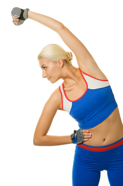 Treinador de fitness fazendo exercício com um halteres
 - Foto, Imagem