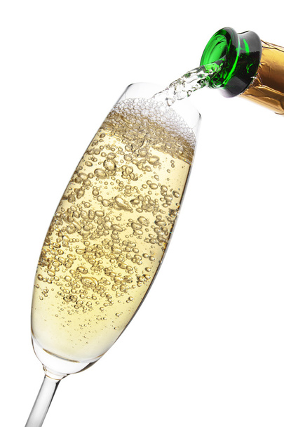 Champagne pouring into a glass. - Zdjęcie, obraz