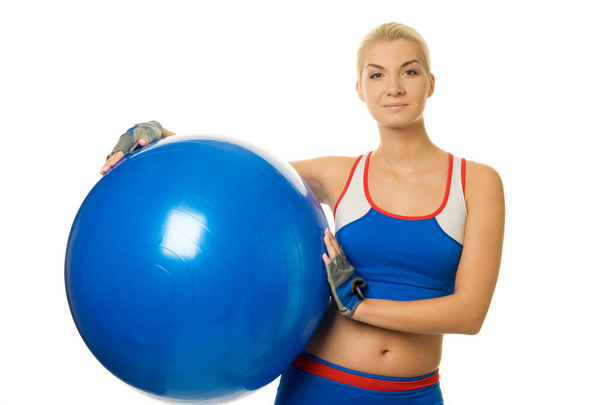 nő edző, fitness labda tartó - Fotó, kép