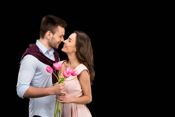 couple in love with tulips - Photo, Image