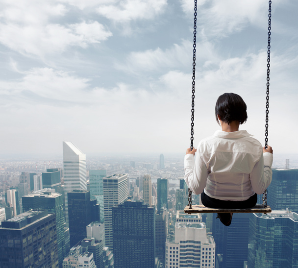 Businesswoman on a swing - Photo, Image