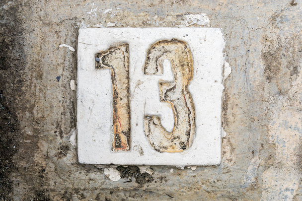 the digits with concrete on the sidewalk 13 - Photo, Image