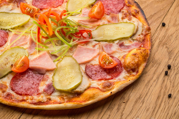 Pizza and pizza slice - Foto, afbeelding