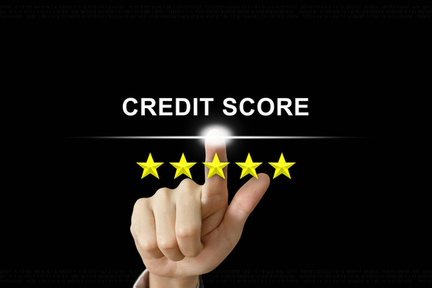 business hand pushing credit score on screen - Photo, Image
