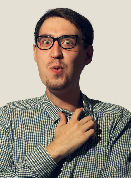 Surprised funny young man wearing glasses - Fotoğraf, Görsel