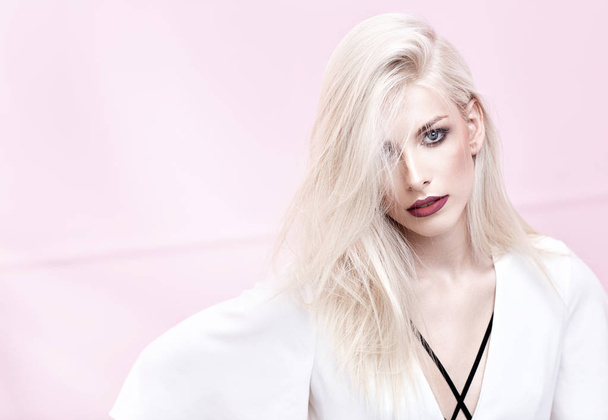Portrait of a young blond model with fabulous coiffure - Fotografie, Obrázek