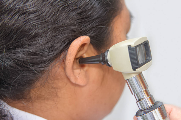Doctor Examining Patient's Ear With Otoscope - Photo, Image