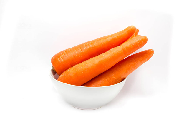 fresh carrots isolated on white background - Foto, afbeelding