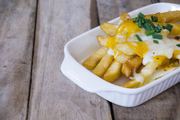 potatoes fried with cheese - Photo, Image