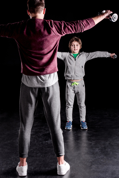 Father and son exercising - Foto, immagini