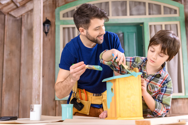 Father and son making birdhouse - Photo, Image