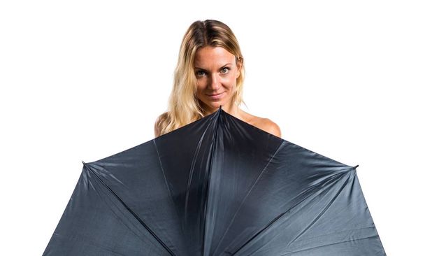 Szép szőke lány egy esernyő tartó - Fotó, kép