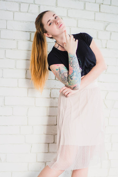 Young tattooed woman - Φωτογραφία, εικόνα