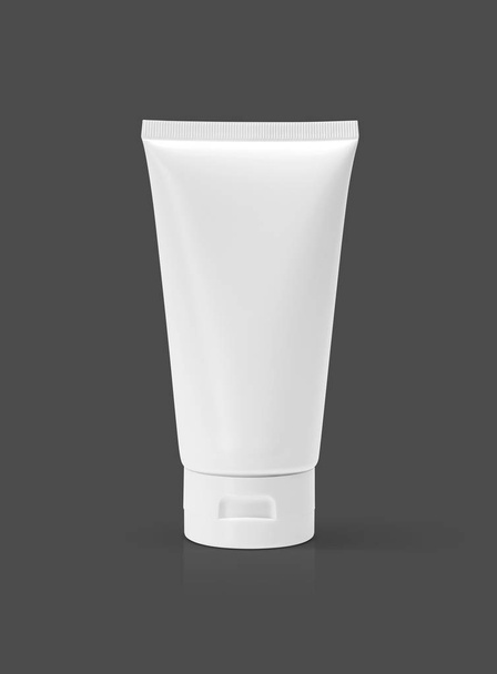blank packaging cosmetic tube isolated on gray background - Foto, imagen