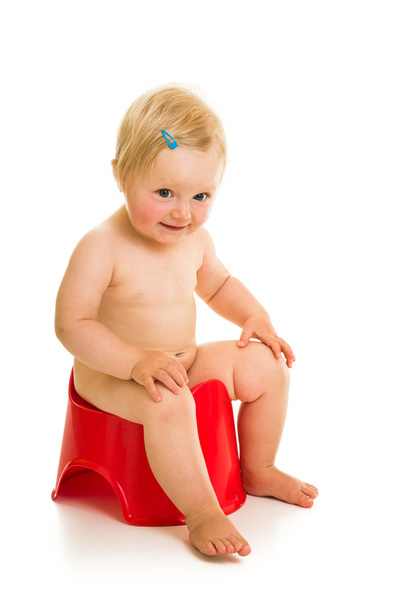 Toddler girl potty trainting isolated on white - Fotografie, Obrázek