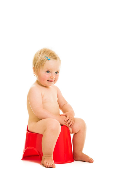 Toddler girl potty trainting isolated on white - Photo, Image