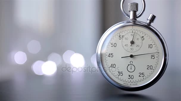 Clock on a blurry background with bokeh - Footage, Video