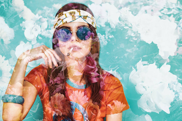 Double exposure of beautiful hippy girl smoking weed and flowers - Fotografie, Obrázek