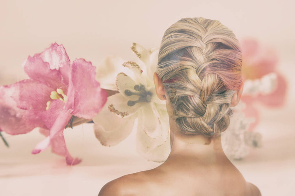 Double exposure of woman with beautiful braided hairdo and flowers - Foto, imagen