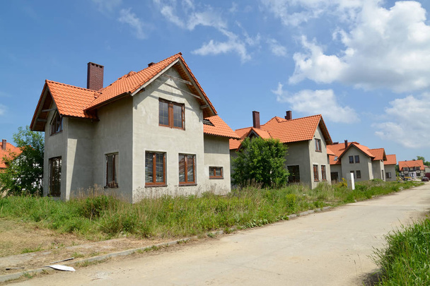 New cottages in the settlement under construction - Photo, Image