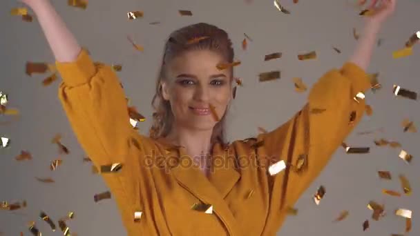 Winning shot, jackpot. Young woman jumping and rejoicing with confetti - Imágenes, Vídeo