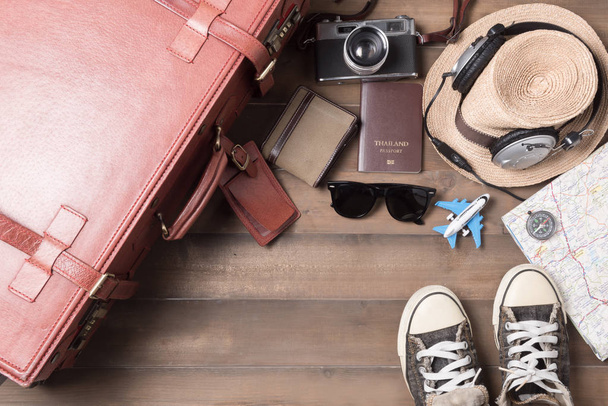 prepare accessories and travel items on wooden board - Valokuva, kuva