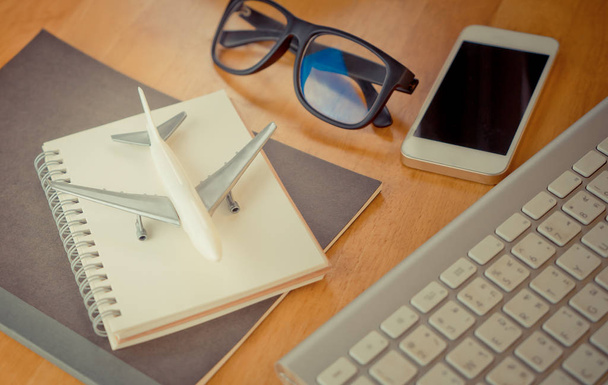 Travel blogger diary writting accessories equipment on desk - Фото, изображение