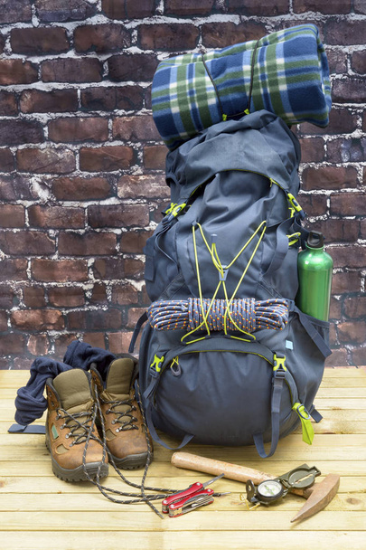 Hiking equipment, rucksack, boots and backpack. - Foto, afbeelding