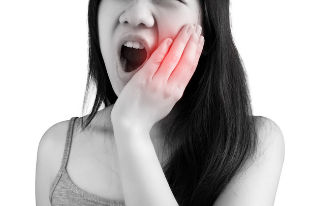 女性の白い背景で隔離の歯痛の症状。白い背景のクリッピングパス. - 写真・画像
