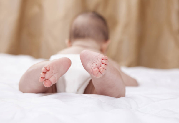 Tiny newborn baby foot - Photo, image