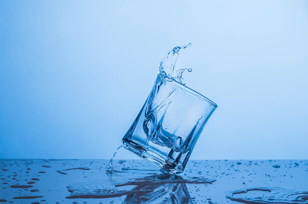 Water splash in a glass - Фото, изображение