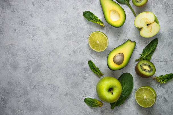 Healthy green food background - smoothie and ingredients. - Фото, зображення