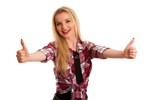 cute young woman in checkered shirt gestures success with arms u - Foto, immagini