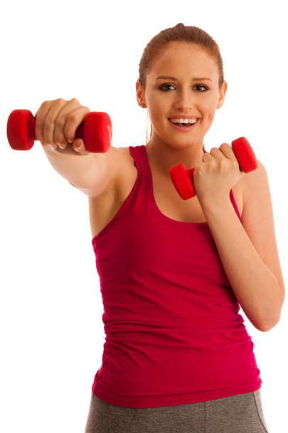 fitness gym - woman works out with dumbbells isolated over white - Photo, image