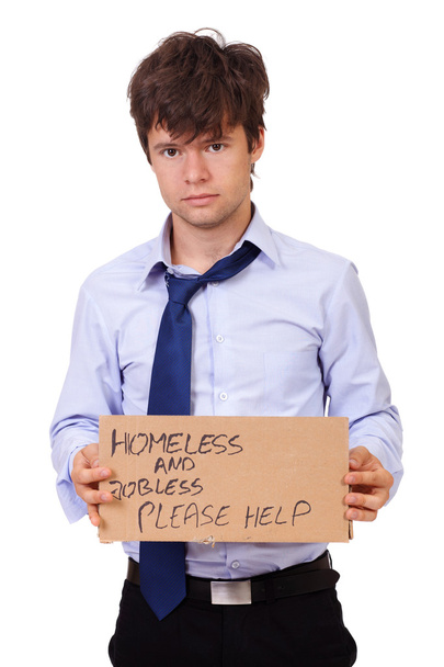 Deprimido joven empresario sosteniendo un cartón, aislado en whi
 - Foto, Imagen