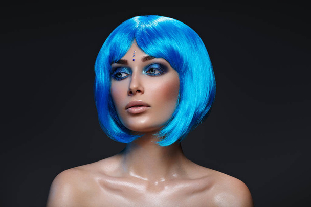 Beautiful girl in blue wig - 写真・画像