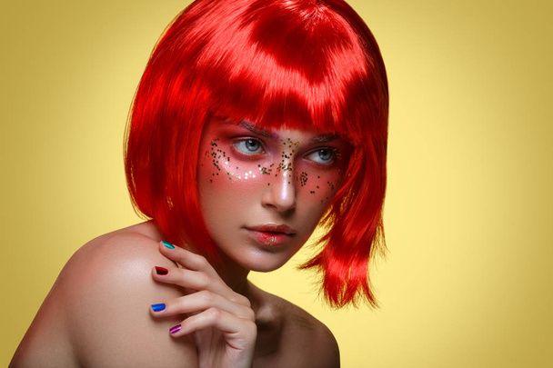 Beautiful girl in red wig - Фото, изображение