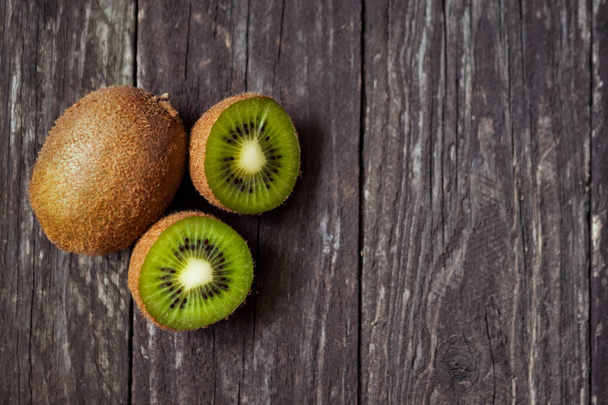 Fresh group of kiwi fruits and slice - Fotografie, Obrázek