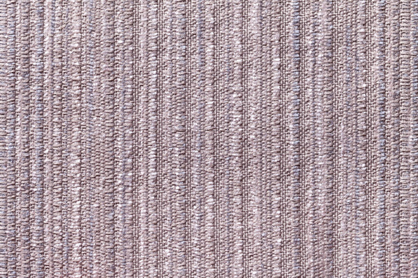 Bruine achtergrond van een gebreide textielstoffen. Stof met een gestreepte textuur-closeup. - Foto, afbeelding