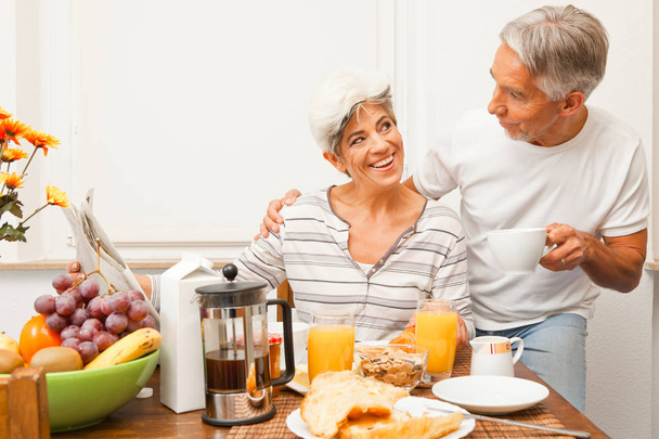 Happy Senior Couple Having Breakfast - Foto, imagen