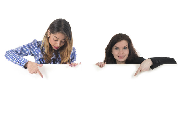 Two Young woman with white board for advertisement - Fotoğraf, Görsel