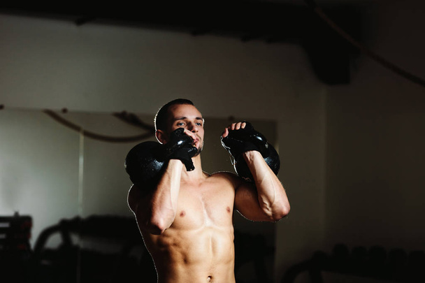 handsome athlete with Kettlebell - Photo, Image