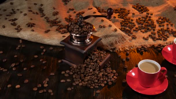 Two red cups with latte coffee on the wooden table - Materiał filmowy, wideo