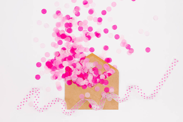 Pink paper confetti fly out enoverta, holiday concept - Φωτογραφία, εικόνα