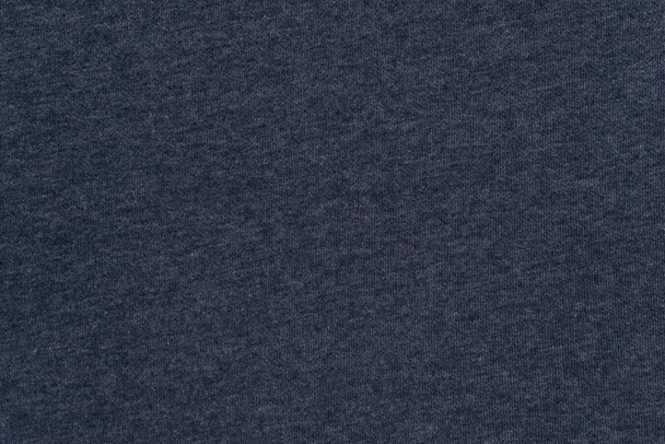 текстурированный фон из трикотажной ткани темно-синего цвета
 - Фото, изображение